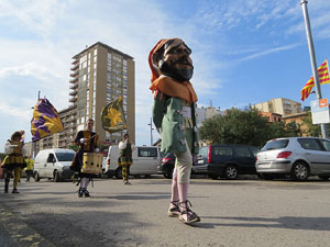 Fires de Sant Narc&iacute;s 2018. Toc de rams. Canvi dels rams de flors de les gegantes de Girona