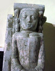Atlant. Suport de pedra que sostenia l'altar major. Segles XVI-XVII